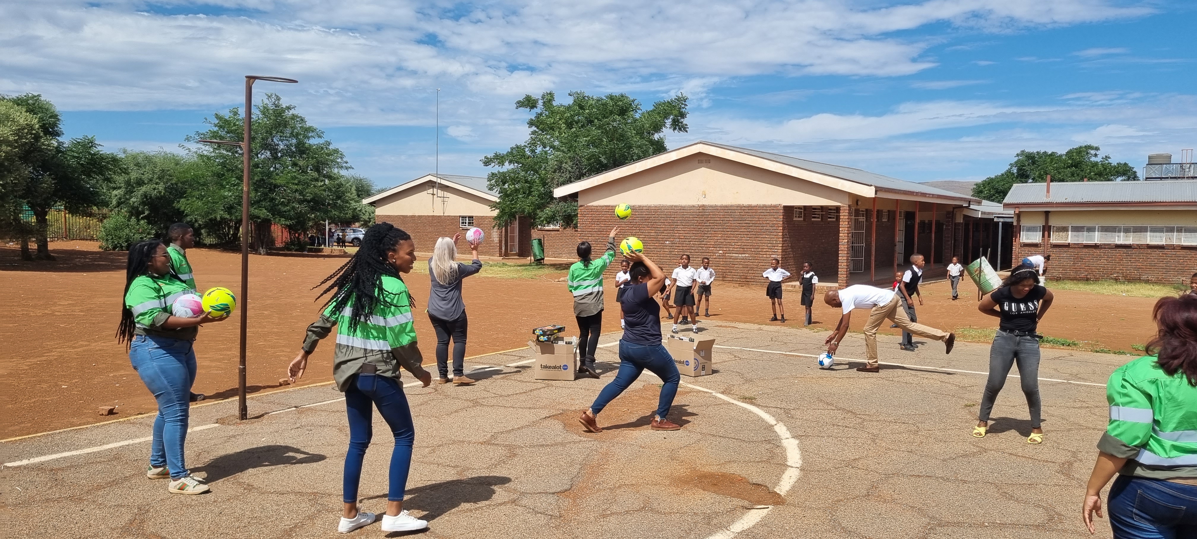 Team members of VBKOM and SSM are playing ball